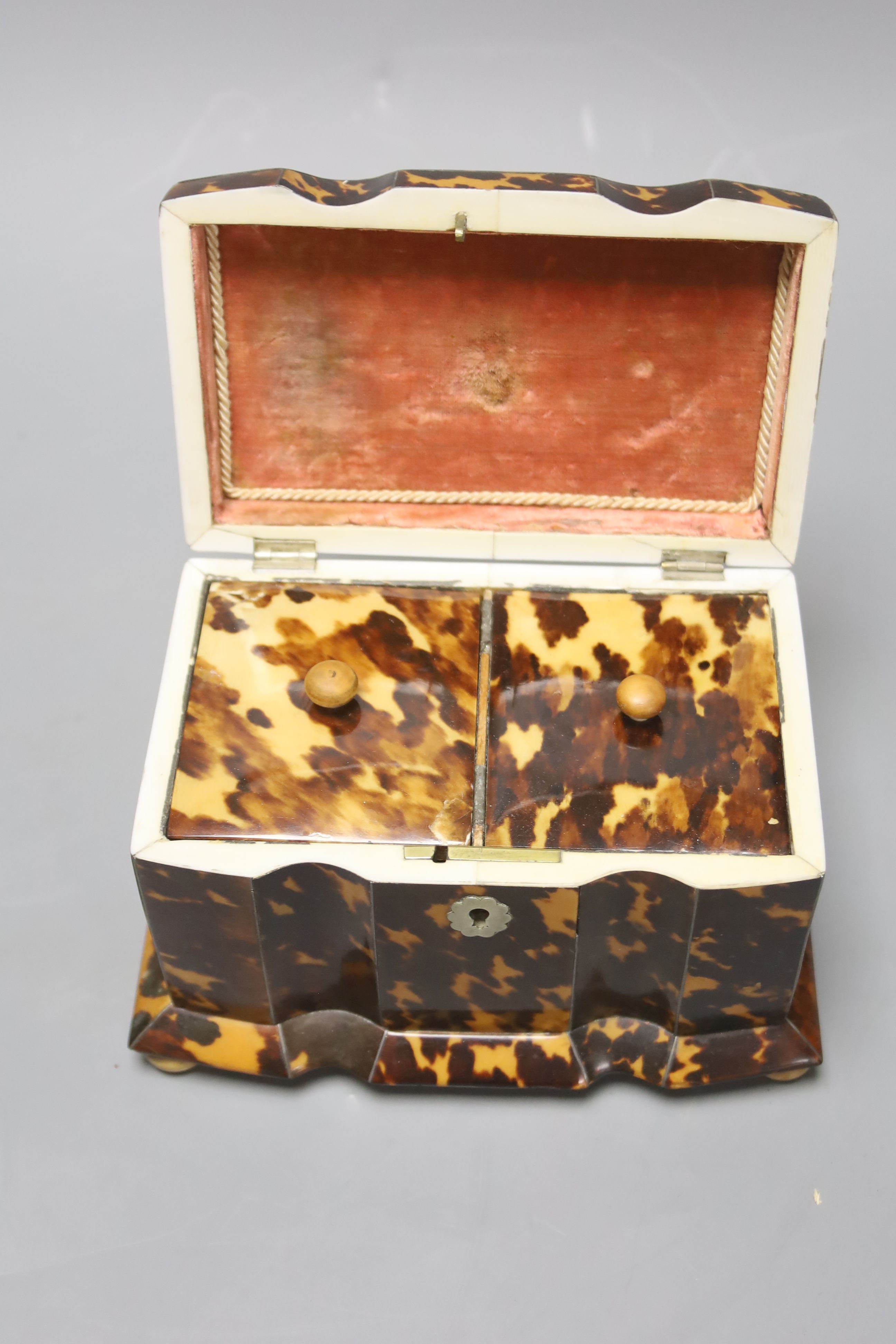 A 19th century tortoiseshell and ivory tea caddy, width 8.5cm height 11cm